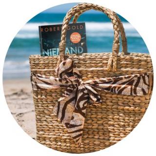 Badetasche. Link zu unserem Onlineschaufenster Bücher für die Badetasche.